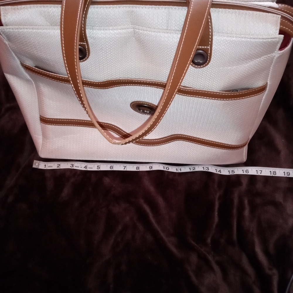 DELSEY.PARIS CREAM COLOR COMPUTER BAG.  15 X 12